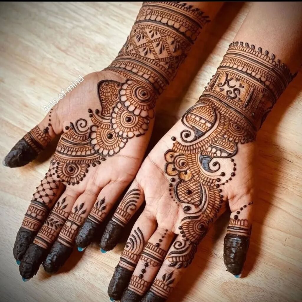 stylish back hand mehndi designs​